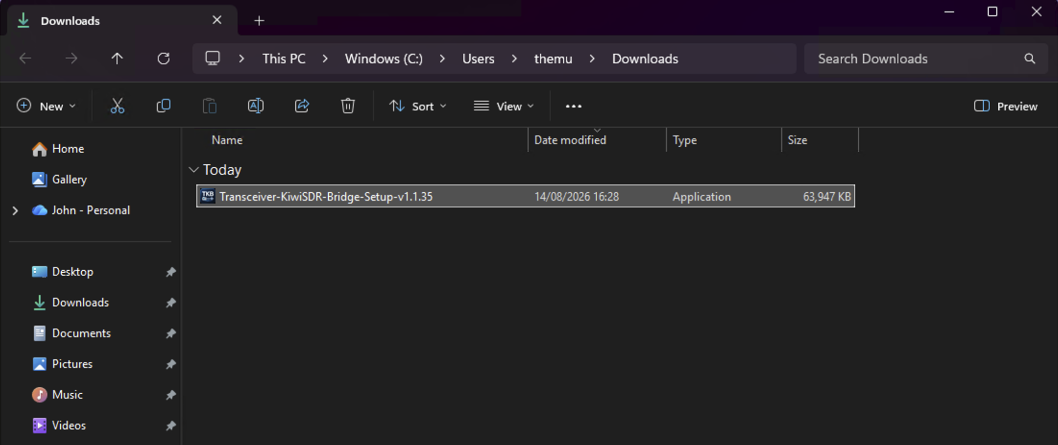 Windows Downloads folder with the installer file visible